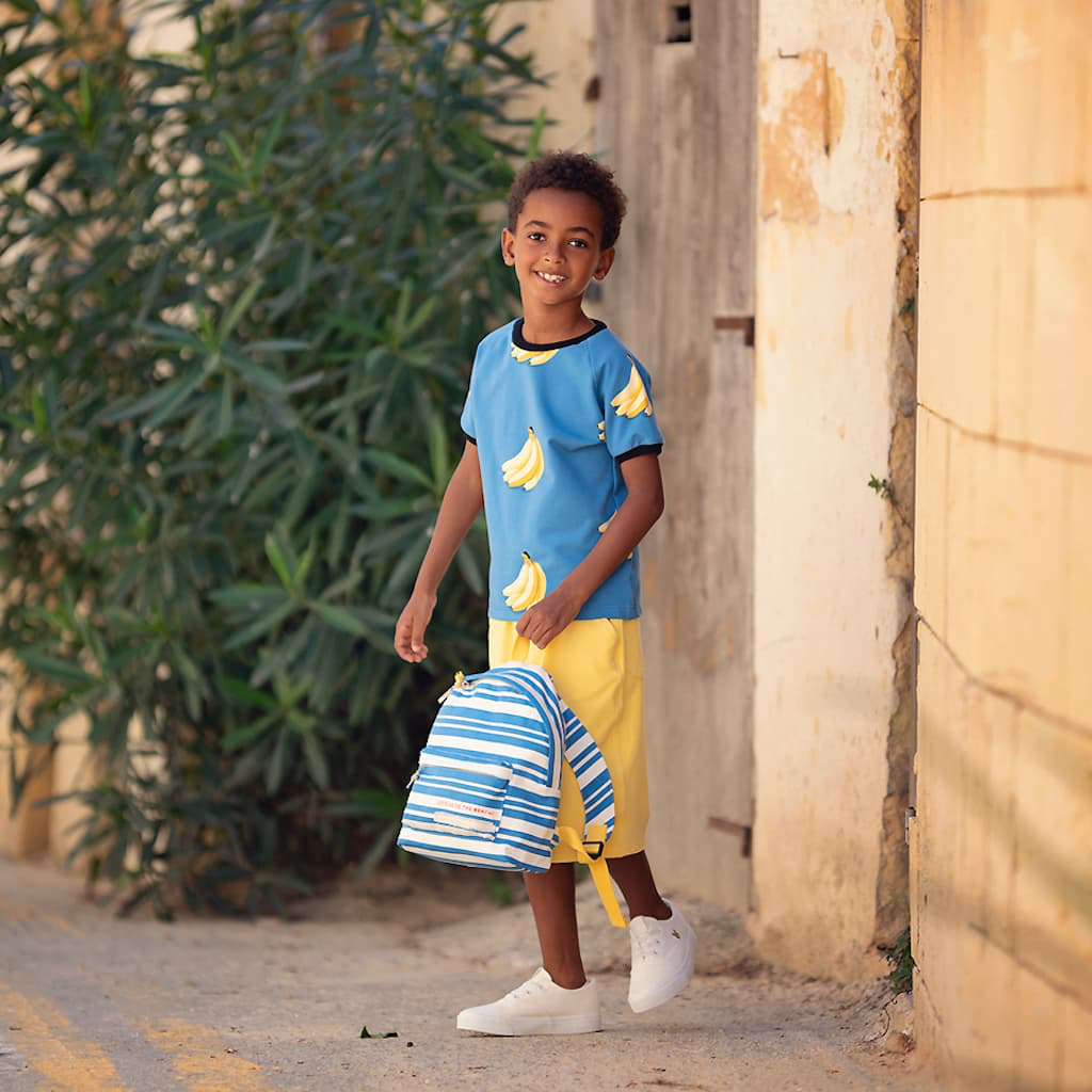 See-You-at-Six-Tissu-French-Terry-de-Coton-Imprime-Bananas-sur-le-Fond-Bleu-Mer-du-Belise-2.webp