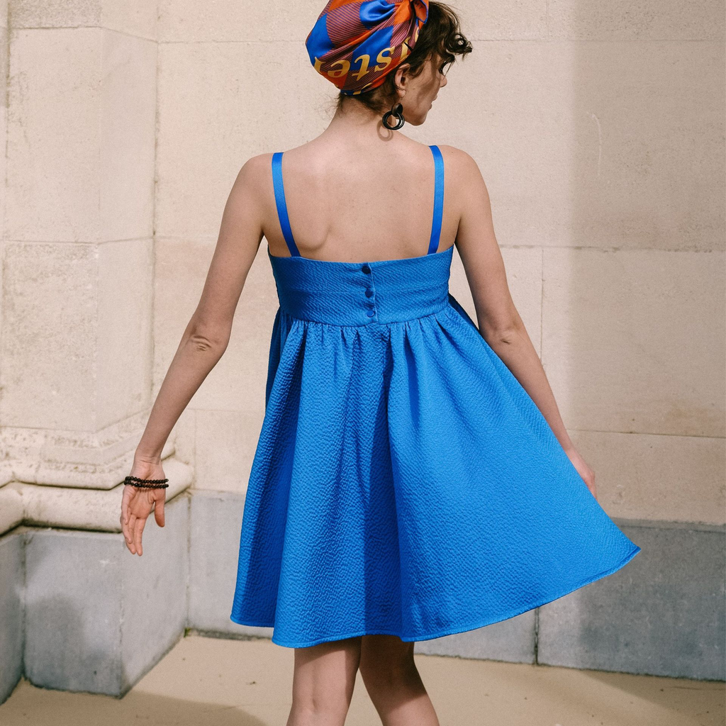 Buy_Notches_Patterns_Kaiko_dress_women_sewing_pattern_twirling_back.webp