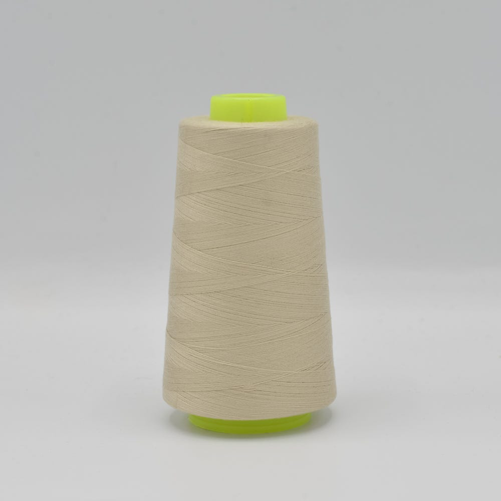 [XOL0011-530-100] Sélection Coup de coudre – Cône Fil Surjeteuse Uni Coloris Champagne (2 743 m)